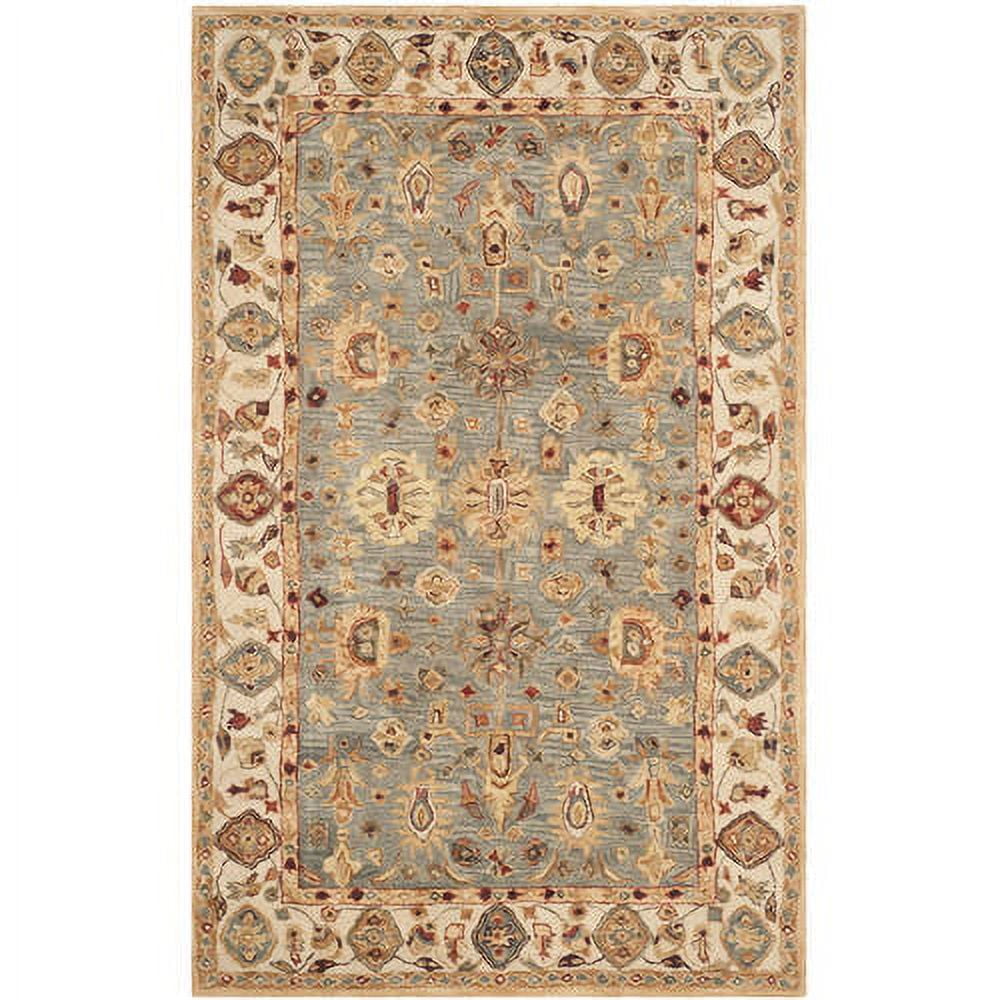Ivory and Blue Hand Tufted Wool 4' x 6' Area Rug