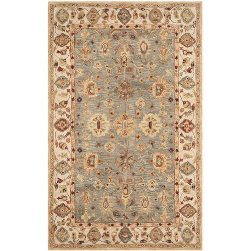 Ivory and Blue Hand Tufted Wool 4' x 6' Area Rug