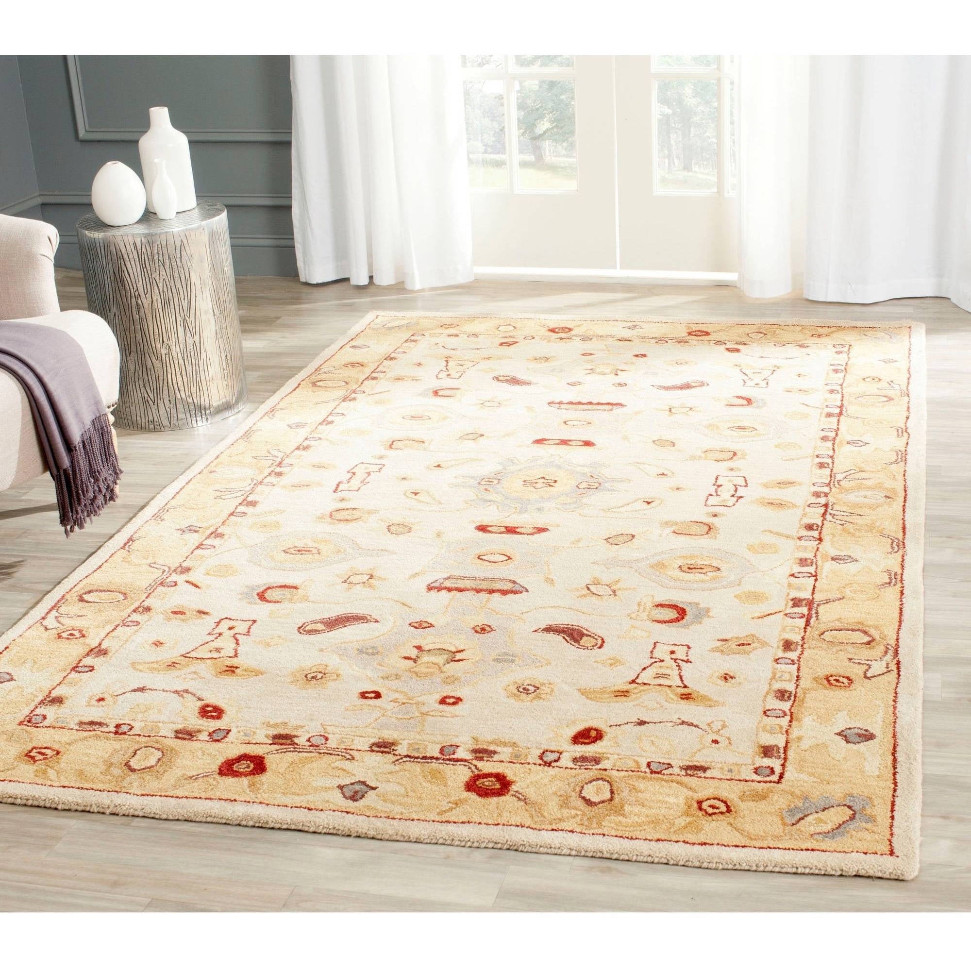 Ivory and Gold Hand-Tufted Wool 4' x 6' Area Rug
