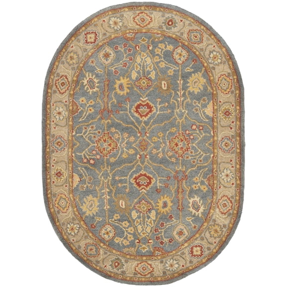 SAFAVIEH Antiquity Chanelle Traditional Wool Area Rug, Blue/Ivory, 7'6" x 9'6" Oval