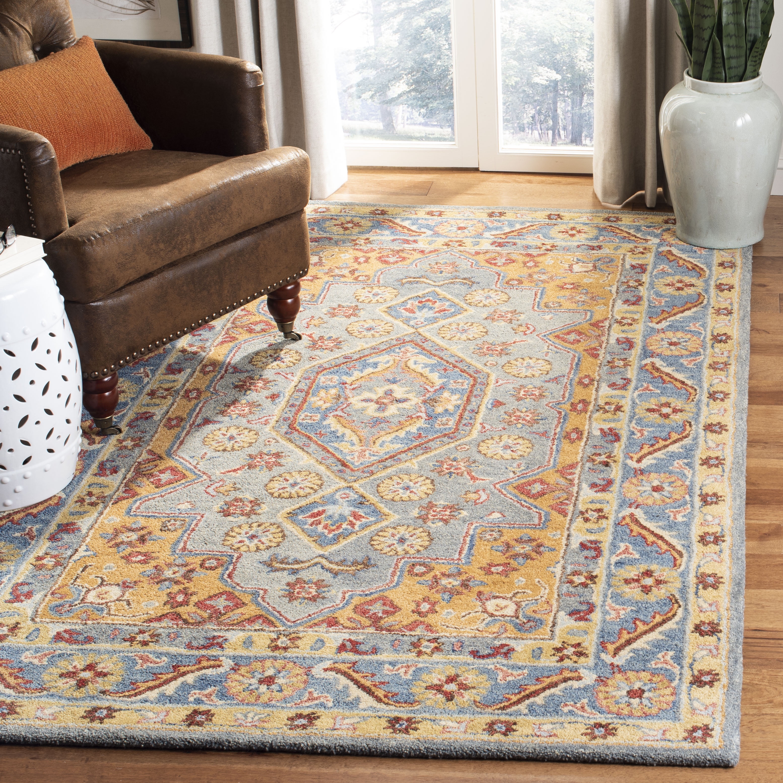 Handmade Blue and Gold Wool Tufted Area Rug, 5' x 8'