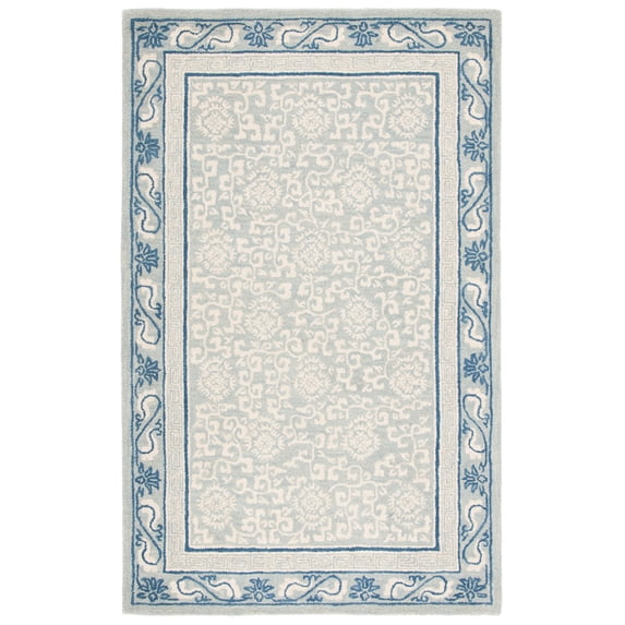 SAFAVIEH Antiquity Tiarnan Oriental Wool Area Rug, Light Blue/Ivory, 5' x 8'