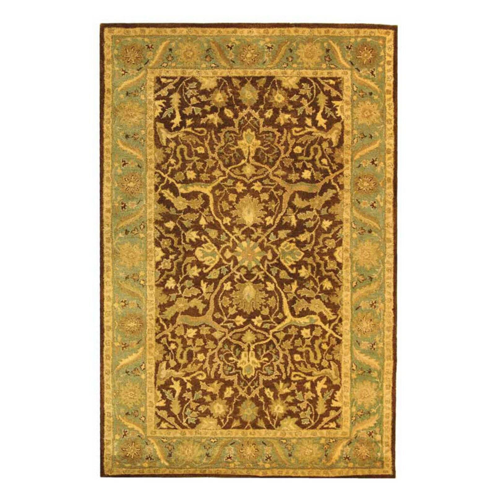 Ivory and Brown Handmade Wool Oval Tufted Rug, 7'6" x 9'6"
