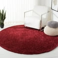 thumbnail image 1 of SAFAVIEH August Carlene Solid Plush Shag Area Rug, Burgundy, 6'7" x 6'7" Round - Modern Design, Burgundy, Non-Shedding & Easy Cleaning, Ultra Plush Thick Pile, Ideal for Living Room, Bedroom, 1 of 9