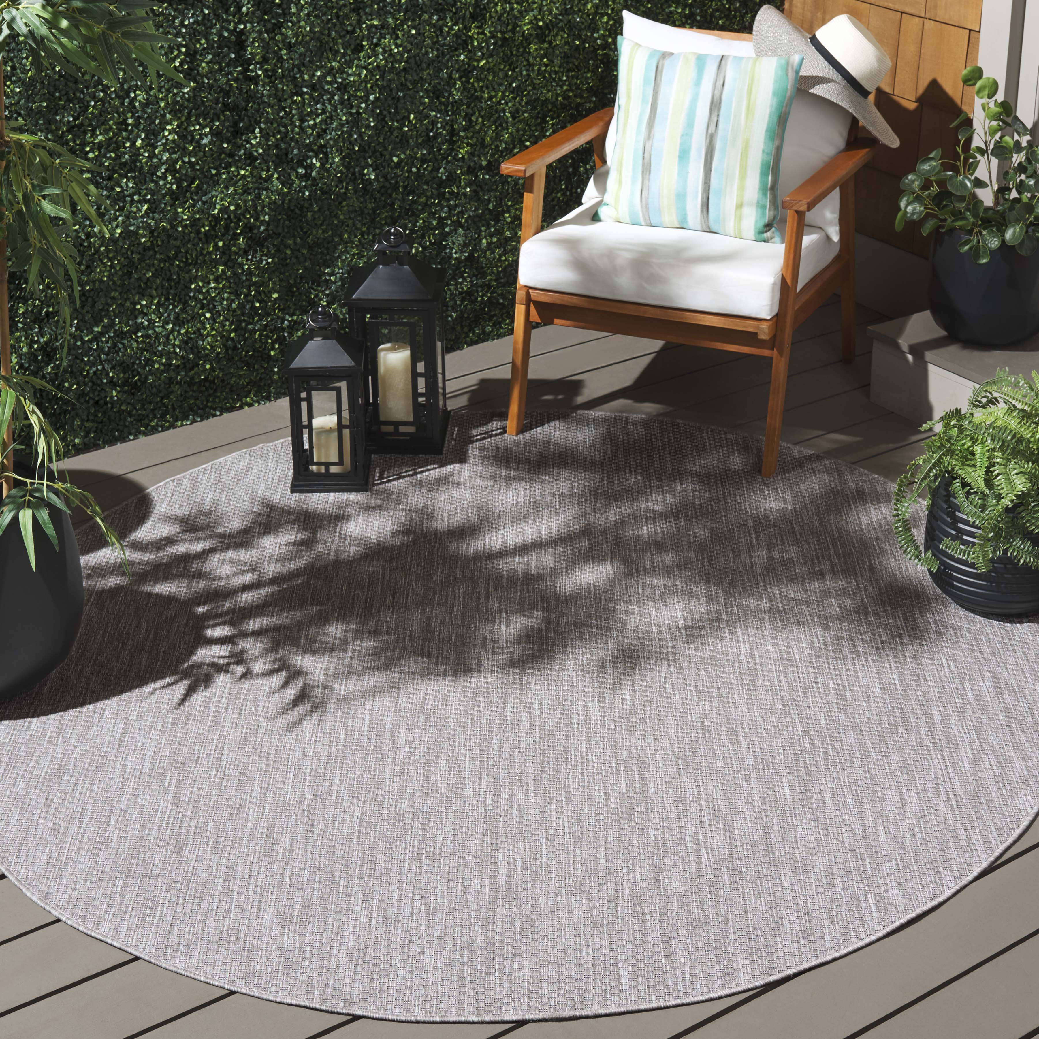 SAFAVIEH Beach House Jacinth Solid Indoor/Outdoor Area Rug, Gray, 6'7" x 6'7" Round