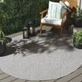 thumbnail image 1 of SAFAVIEH Beach House Jacinth Solid Indoor/Outdoor Area Rug, Gray, 6'7" x 6'7" Round, 1 of 13