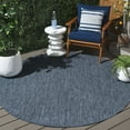 thumbnail image 1 of SAFAVIEH Beach House Jacinth Solid Indoor/Outdoor Area Rug, Navy, 6'7" x 6'7" Round, 1 of 13