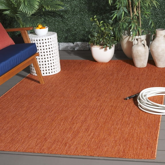 SAFAVIEH Beach House Lauressa Solid Indoor/Outdoor Area Rug, Orange, 9' x 12'