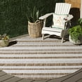 thumbnail image 1 of SAFAVIEH Beach House Merrilyn Striped Indoor/Outdoor Area Rug, Brown/Ivory, 6'7" x 6'7" Round, 1 of 9
