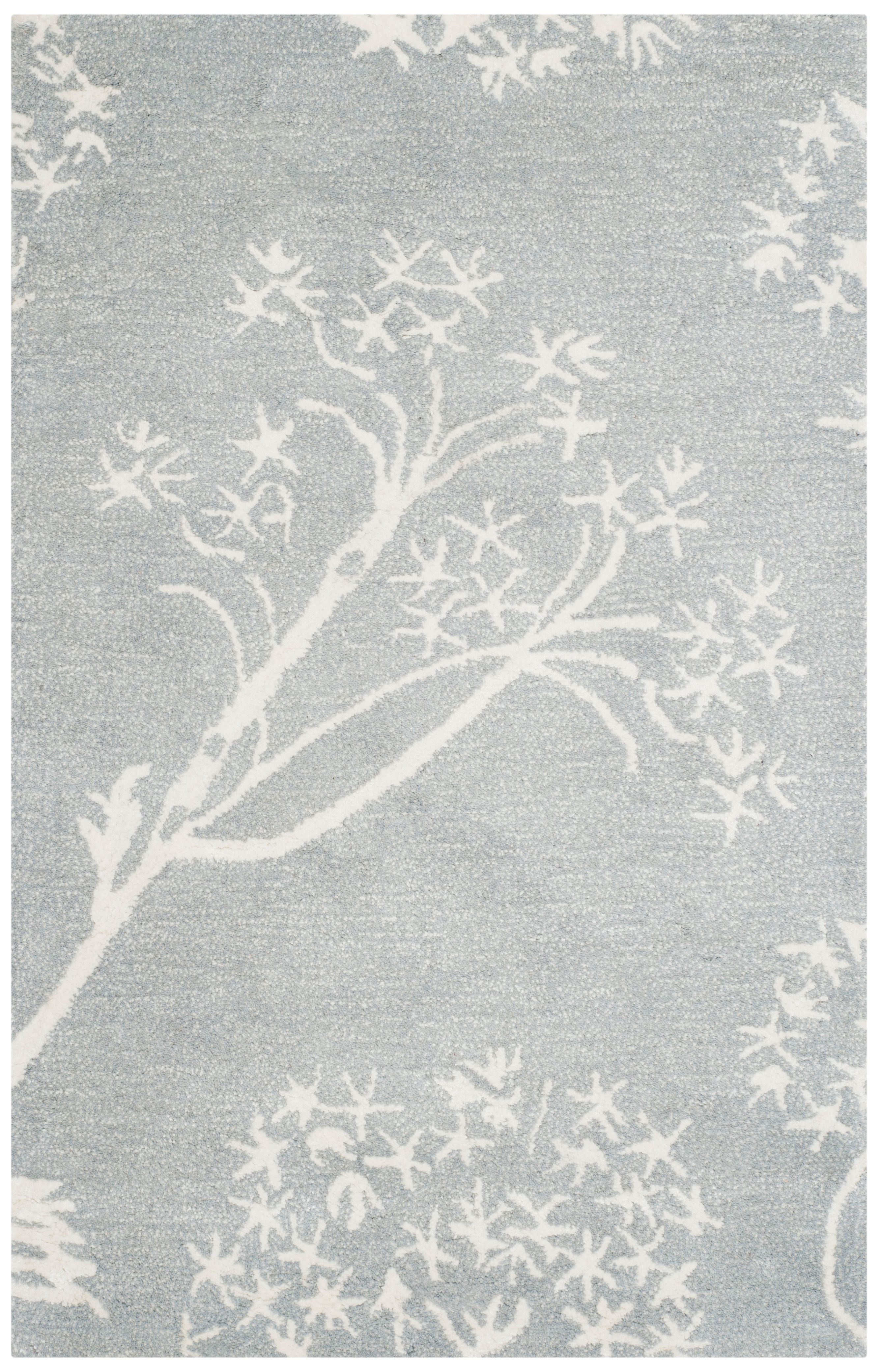 Handmade Light Blue and Ivory Wool Tufted Area Rug