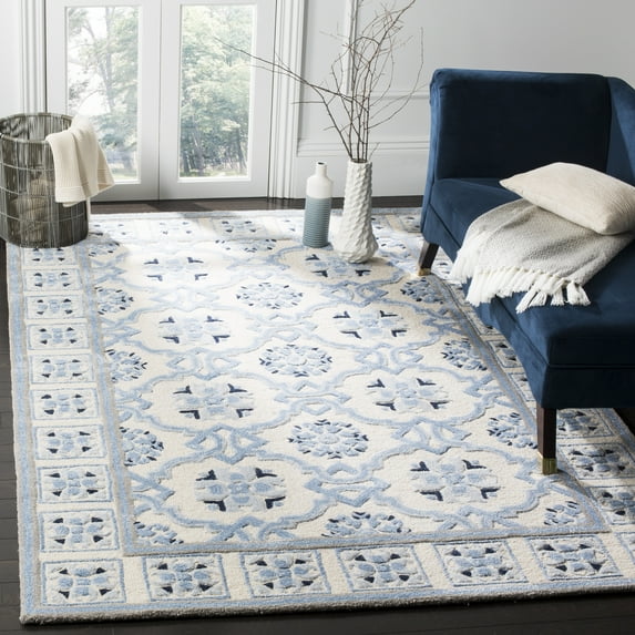 SAFAVIEH Bella Noelle Bordered Area Rug, Ivory/Blue, 9' x 12'