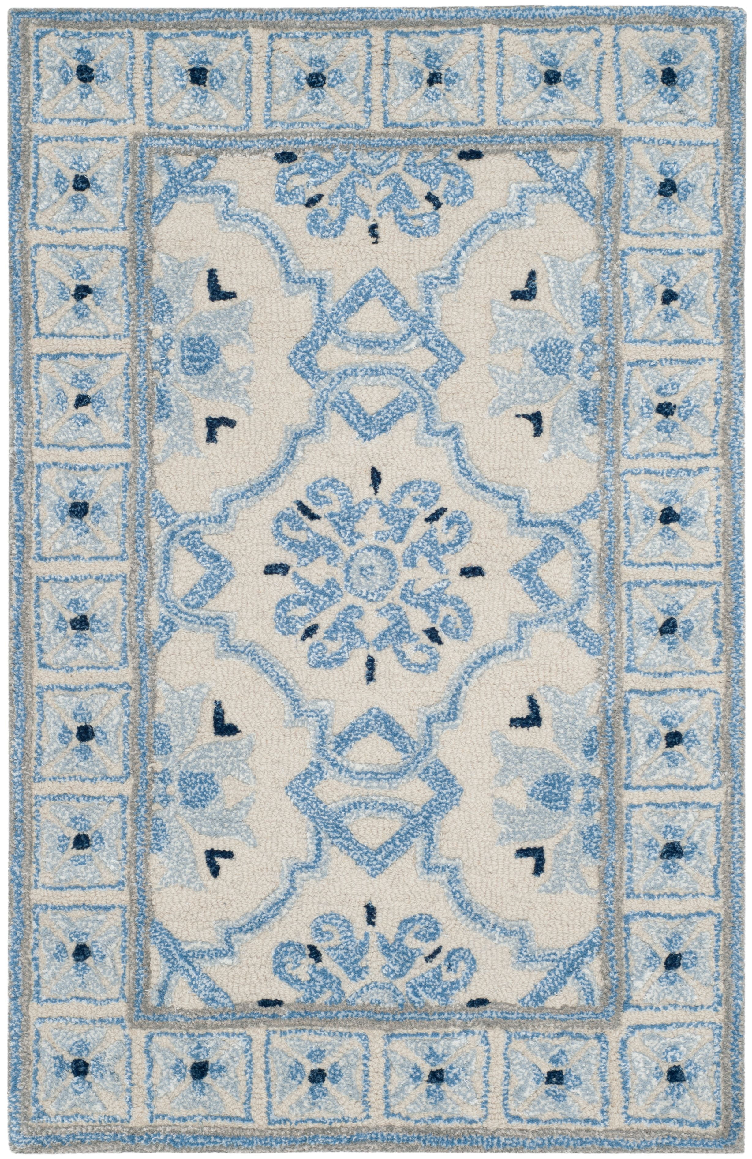Handmade Ivory and Blue Wool Viscose Tufted Area Rug
