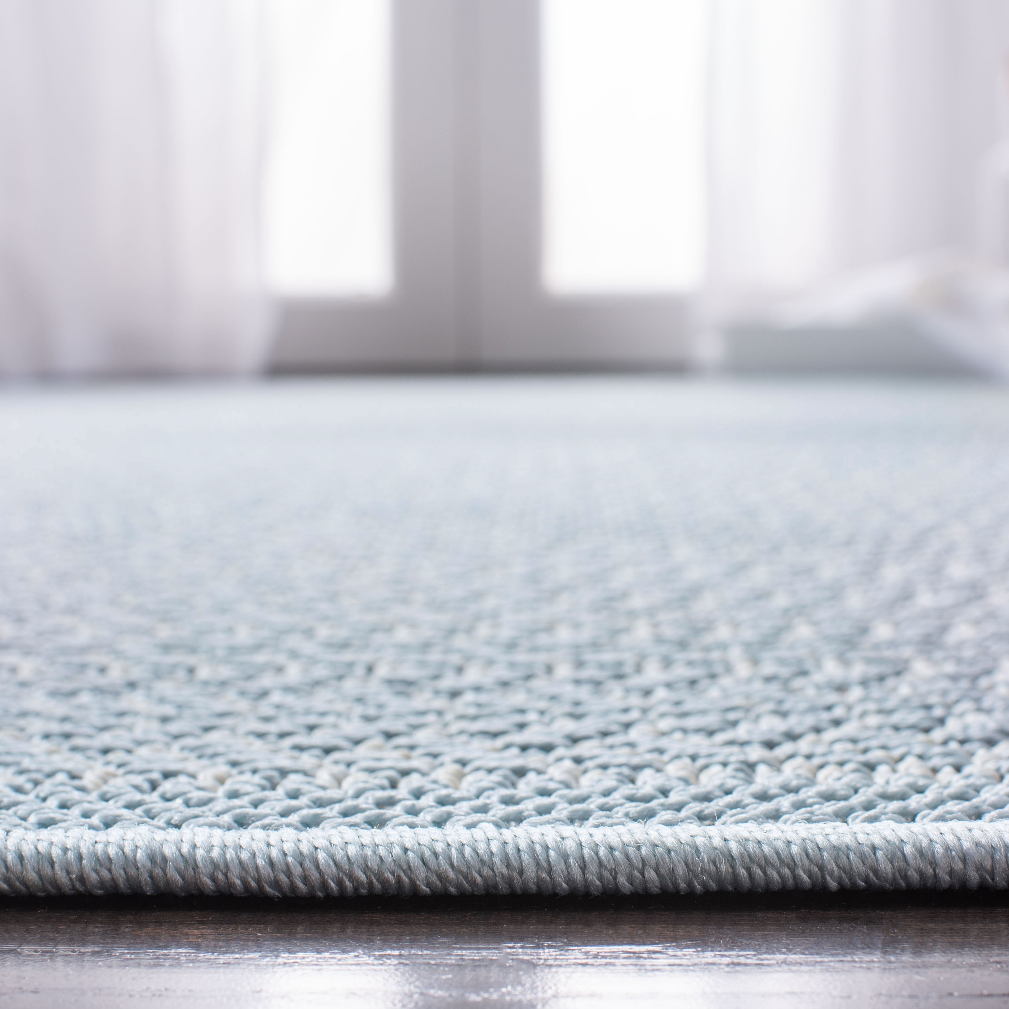 Elowen Light Blue Geometric 2' x 8' Easy-Care Outdoor Rug