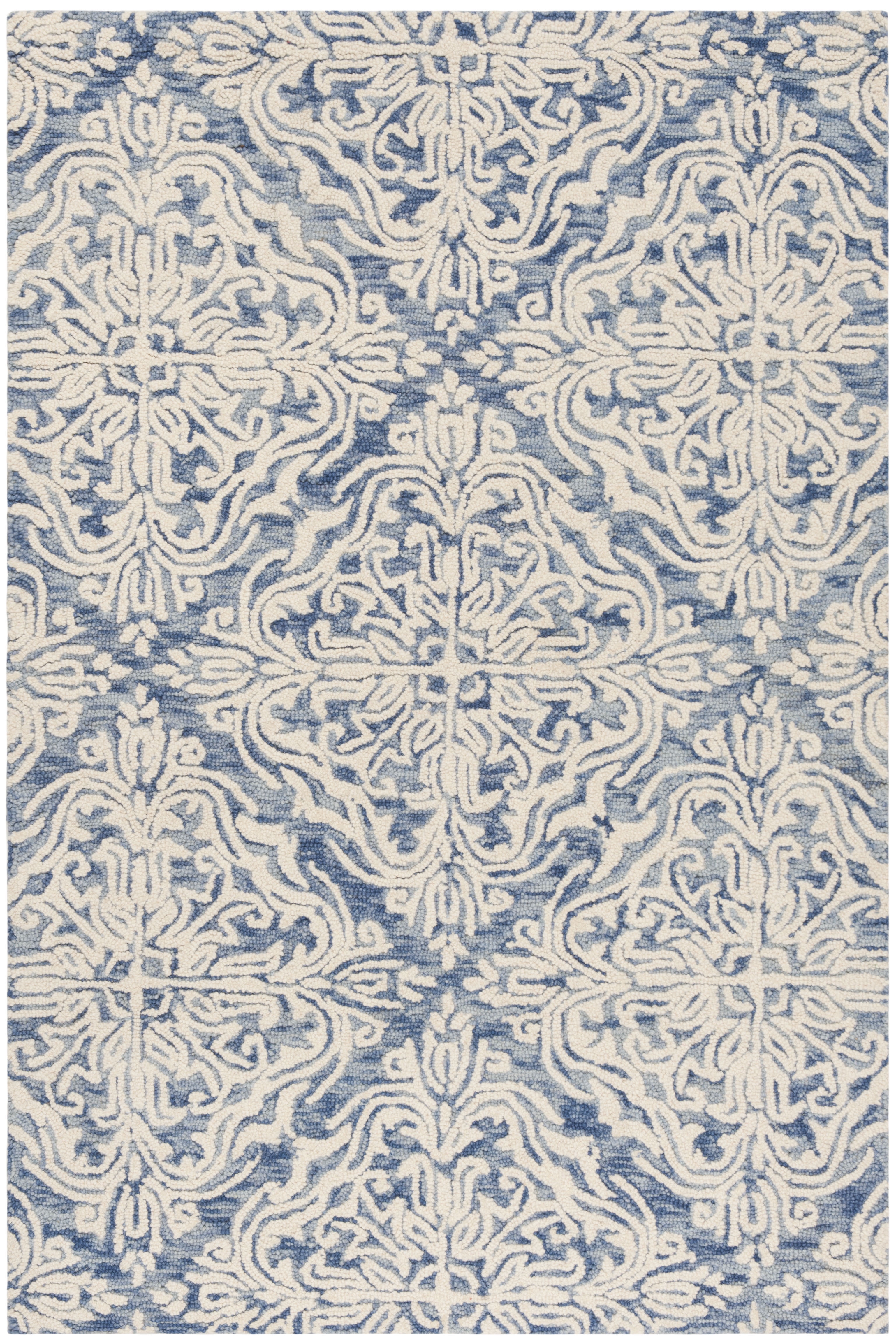 Blue and Ivory Floral Tufted Wool 4' x 6' Area Rug