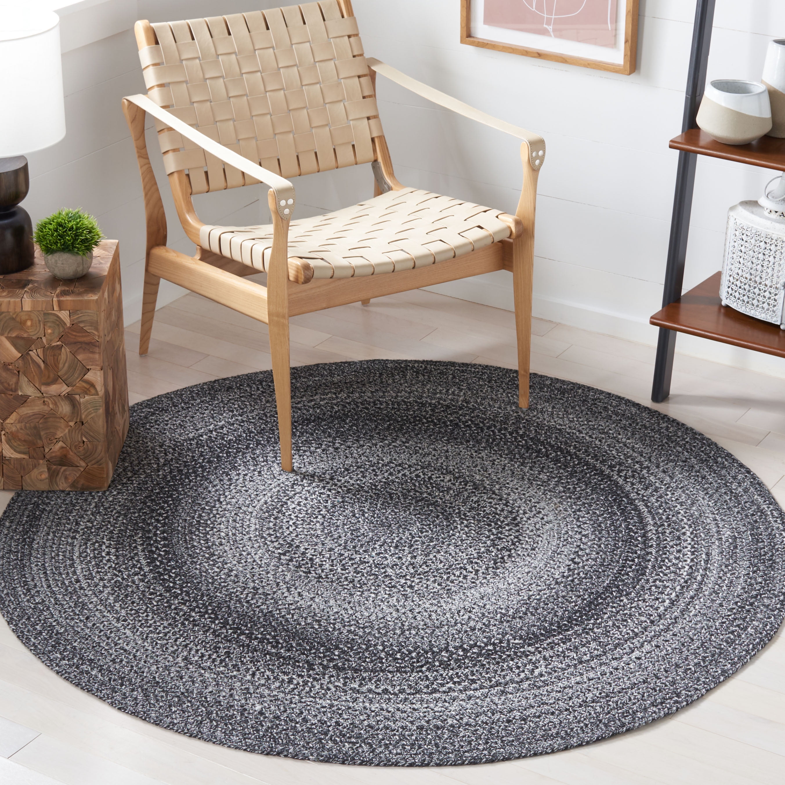 SAFAVIEH Braided Lyla Solid Polyester Reversible Area Rug, Black/Ivory, 4' x 4' Round