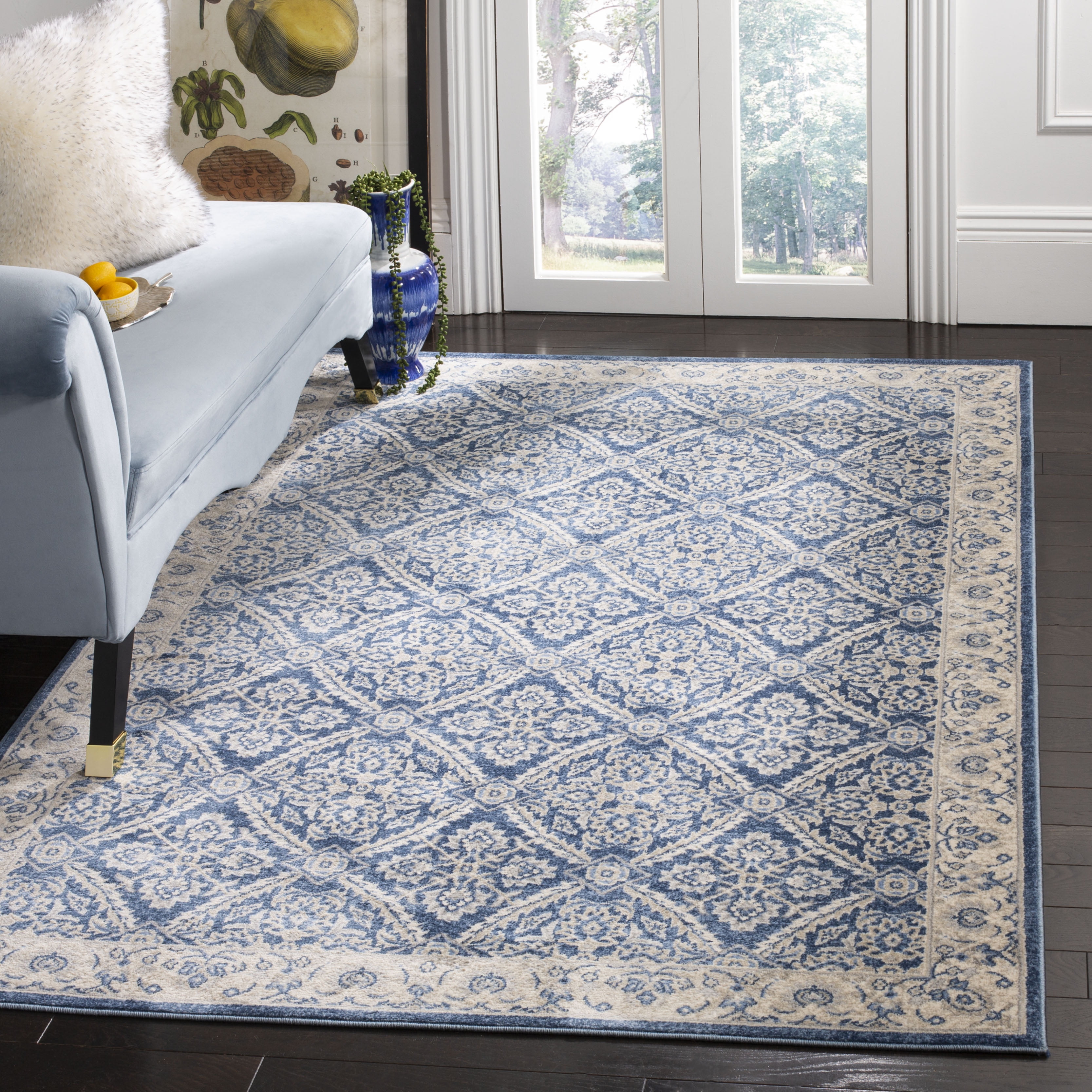 Navy and Cream Synthetic Bohemian Area Rug with Border Embellishment