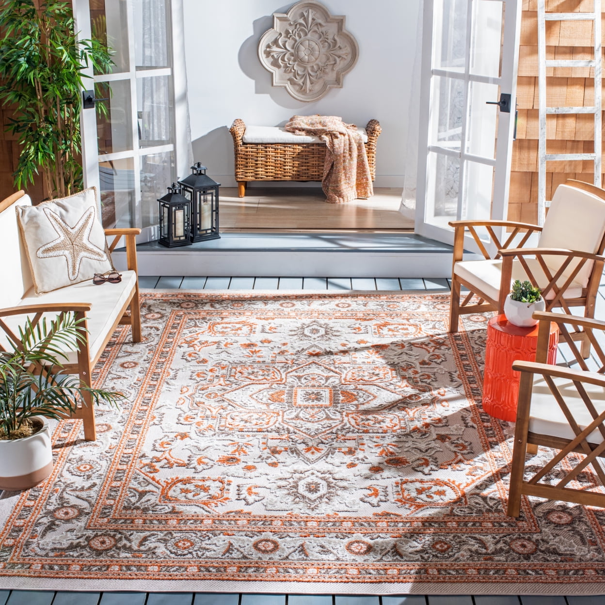 Beige and Orange Floral Synthetic Rectangular Area Rug 5'5" x 7'7"