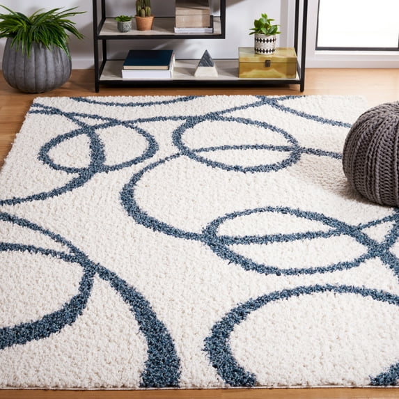 SAFAVIEH Calico Orval Abstract Polyester Shag Area Rug, Ivory/Blue, 5'3" x 7'6"