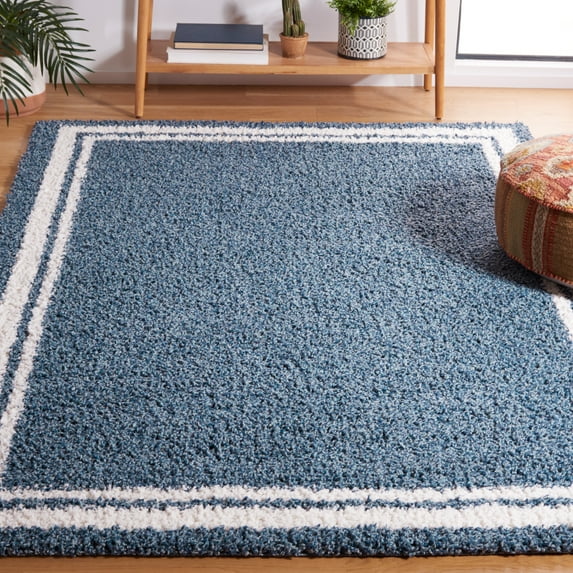 SAFAVIEH Calico Stojan Geometric Polyester Shag Area Rug, Blue/Ivory, 5'3" x 7'6"