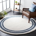 thumbnail image 1 of SAFAVIEH Calico Stojan Geometric Polyester Shag Area Rug, Ivory/Blue, 6'7" x 6'7" Round, 1 of 8