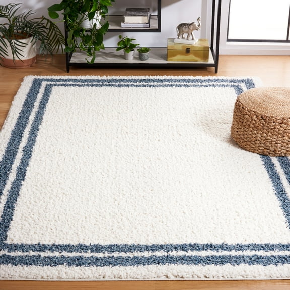 SAFAVIEH Calico Stojan Geometric Polyester Shag Area Rug, Ivory/Blue, 8' x 10'