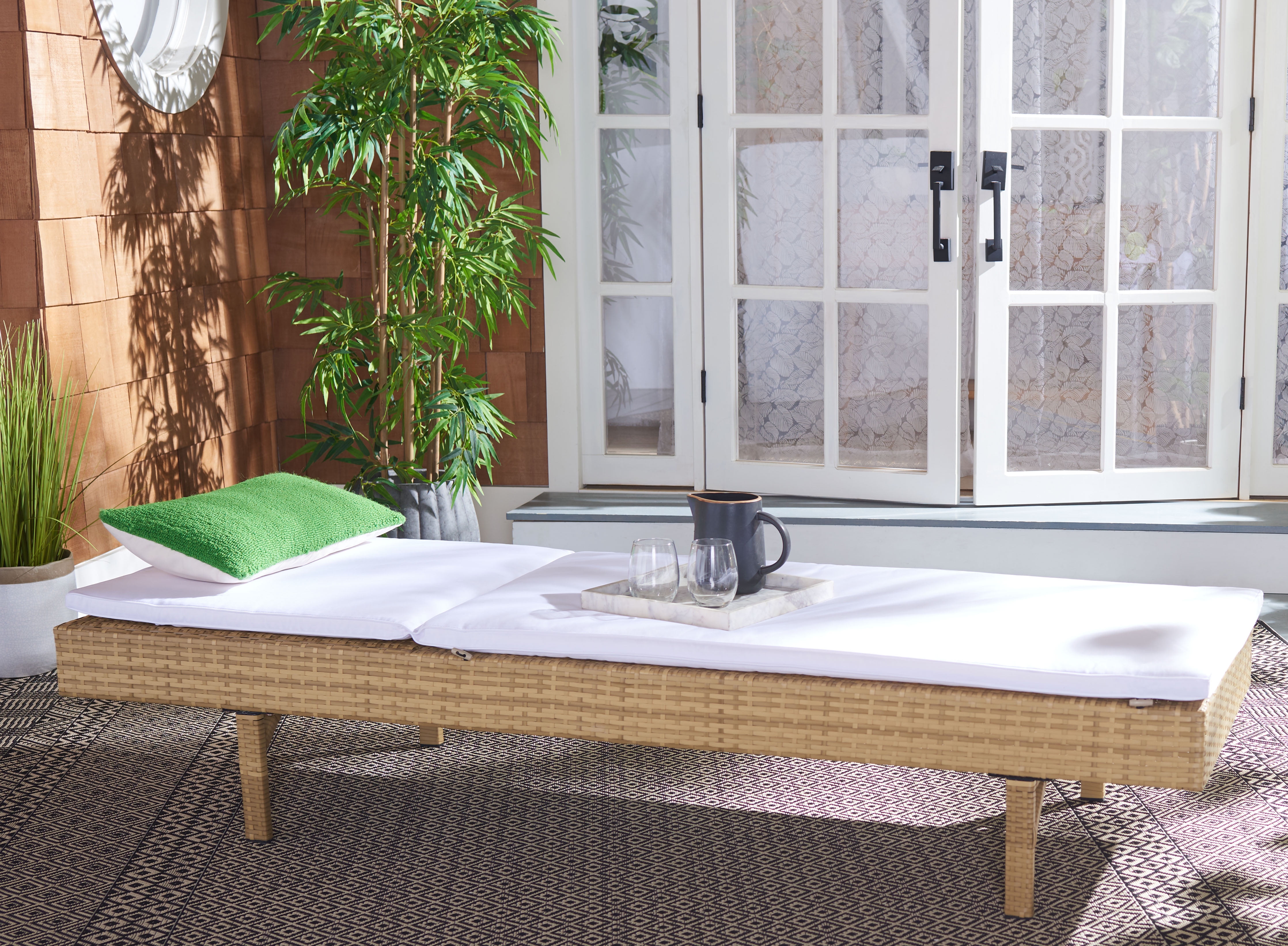 Natural Wicker Outdoor Chaise Lounger with White Cushions