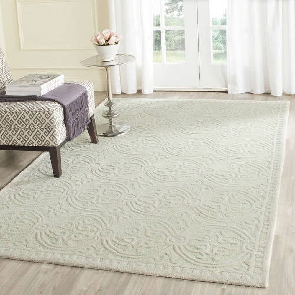Light Green and Ivory Tufted Wool Area Rug, 6' x 9'