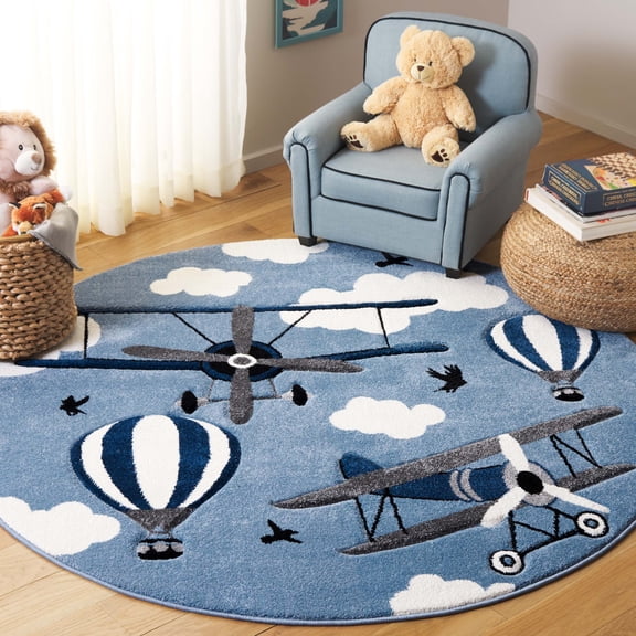 SAFAVIEH Carousel Kids Biplanes in the Sky Area Rug, Blue/Ivory, 5'3" x 5'3" Round