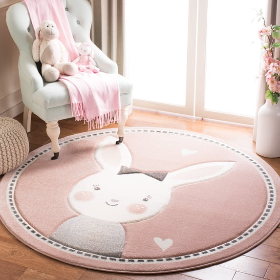 SAFAVIEH Carousel Kids Clark Shy Bunny Area Rug, Pink/Ivory, 8' x 8' Round
