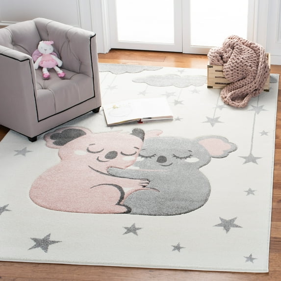 SAFAVIEH Carousel Kids Hugging Koalas Area Rug, Ivory/Pink, 6'7" x 9'