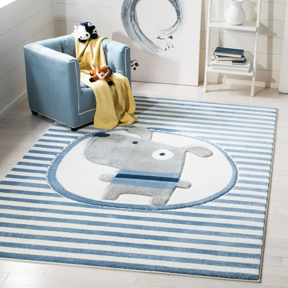 SAFAVIEH Carousel Kids Orpa The Dog Area Rug, Ivory/Blue, 2' x 3'