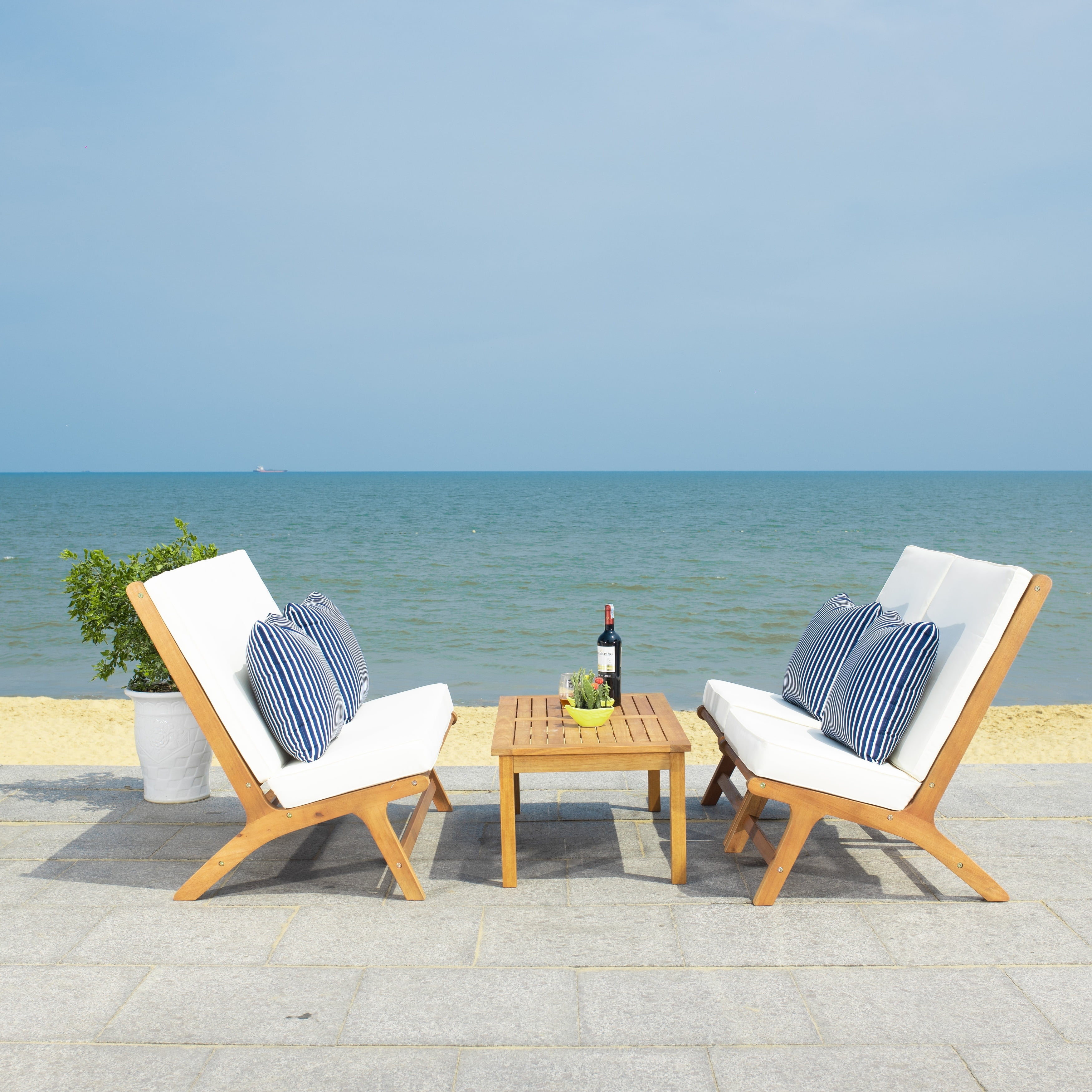 Natural Wood 4-Piece Patio Set with Beige Cushions and Navy Striped Pillows