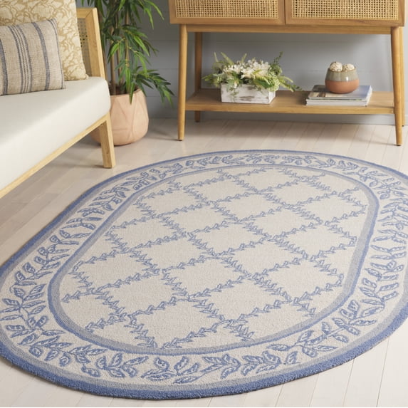 Safavieh Chelsea Alecia Geometric Area Rug, Ivory/Light Blue, 7'6" x 9'6" Oval
