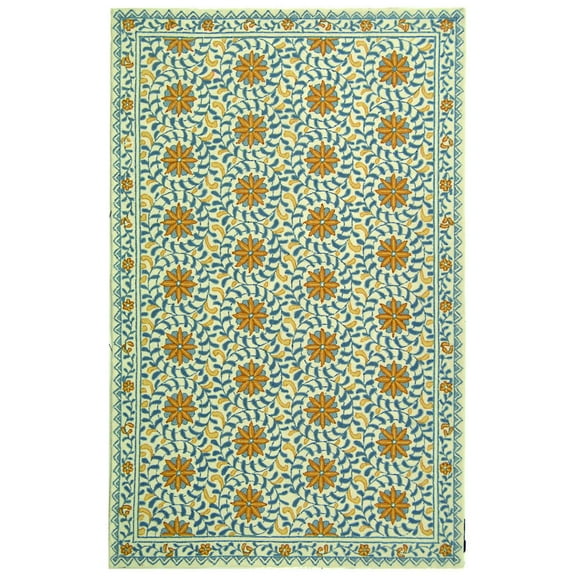 SAFAVIEH Chelsea Alondra Geometric Borders Wool Area Rug, Ivory/Blue, 4'6" x 6'6" Oval