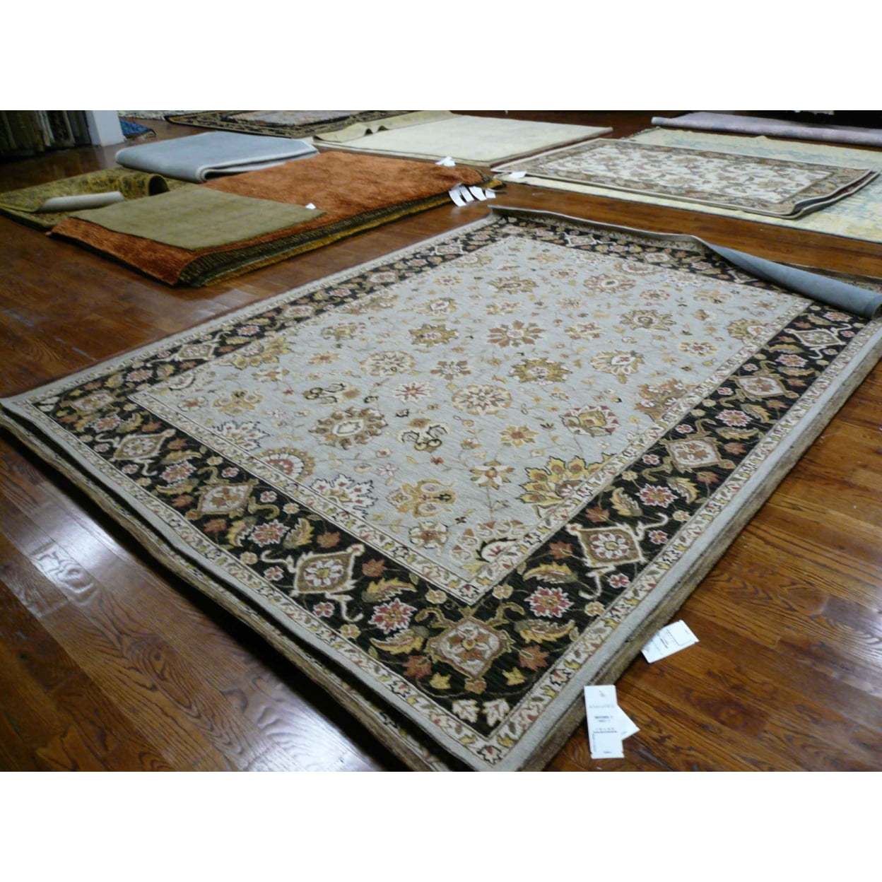 Handmade Rectangular Black Wool 6' x 9' Area Rug