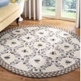 thumbnail image 1 of Safavieh Chelsea Lara Bordered Wool Area Rug, Ivory/Light Blue, 7'6" x 9'6" Oval, 1 of 10