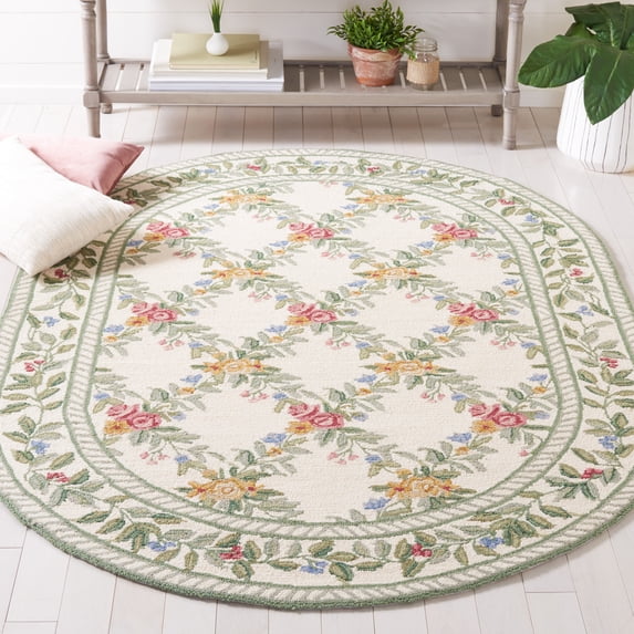Safavieh Chelsea Makayla Bordered Area Rug, Ivory, 4'6" x 6'6" Oval