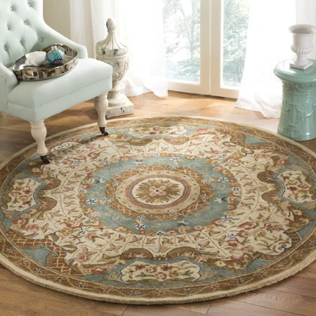 SAFAVIEH Classic Chandler Oriental Wool Area Rug, Ivory/Light Blue, 4'6" x 6'6" Oval