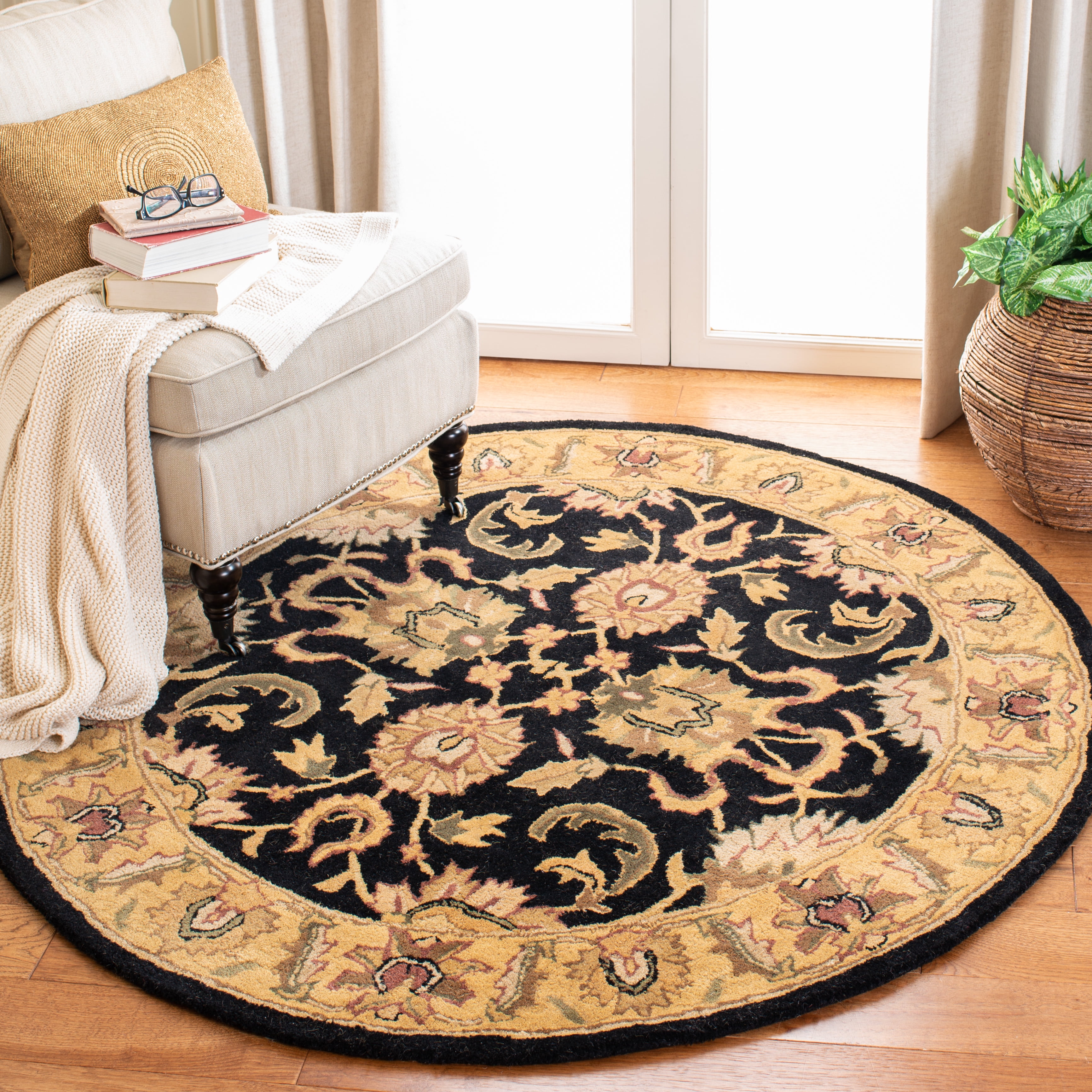 Handmade Black and Gold Oval Wool Area Rug