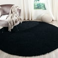 thumbnail image 1 of SAFAVIEH Clyde Solid Plush Polyester Shag Area Rug, Black, 5' x 5' Round, 1 of 3