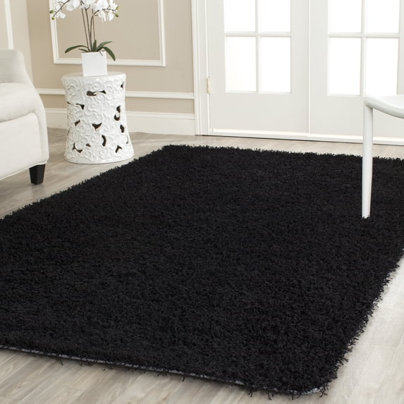 SAFAVIEH Clyde Solid Plush Polyester Shag Area Rug, Black, 8' x 10'