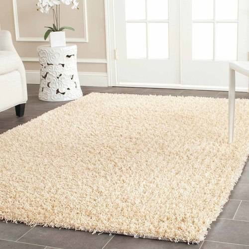 SAFAVIEH Clyde Solid Plush Polyester Shag Area Rug, Cream, 3' x 5'