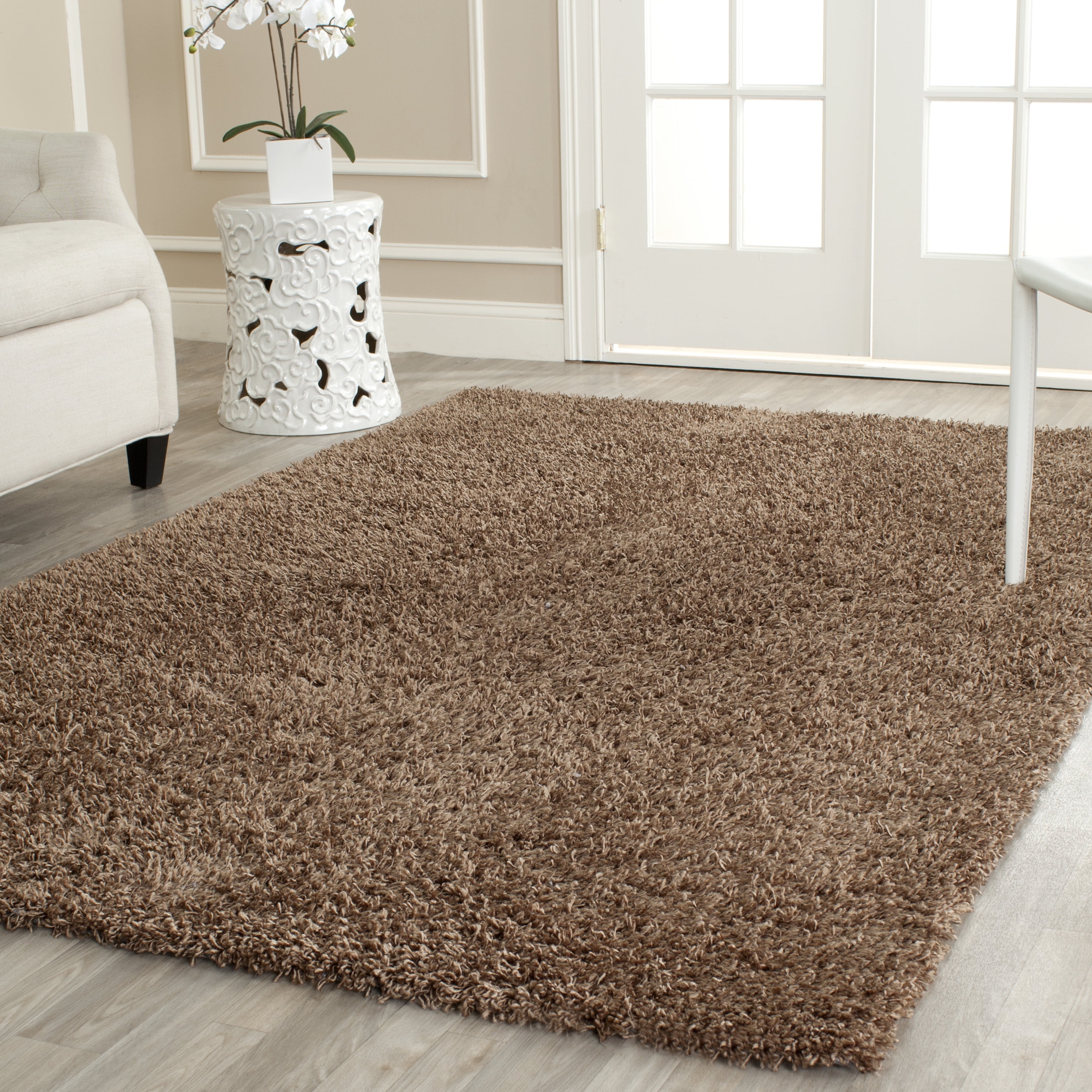 SAFAVIEH Clyde Solid Plush Polyester Shag Area Rug, Light Brown, 4' x 6