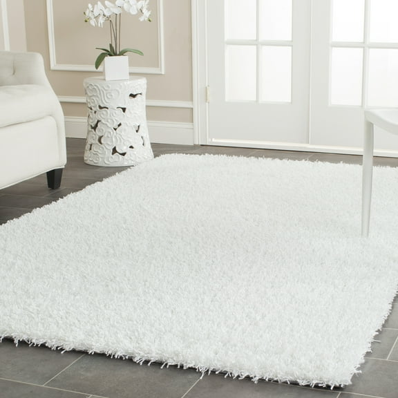 SAFAVIEH Clyde Solid Plush Polyester Shag Area Rug, White, 4' x 6'