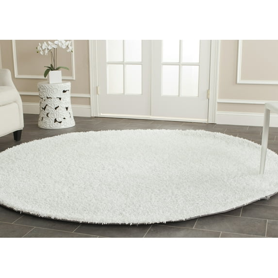 SAFAVIEH Clyde Solid Plush Polyester Shag Area Rug, White, 5' x 5' Round