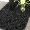 thumbnail image 1 of SAFAVIEH Clyde Solid Plush Polyester Shag Runner Rug, Black, 2'3" x 8', 1 of 5