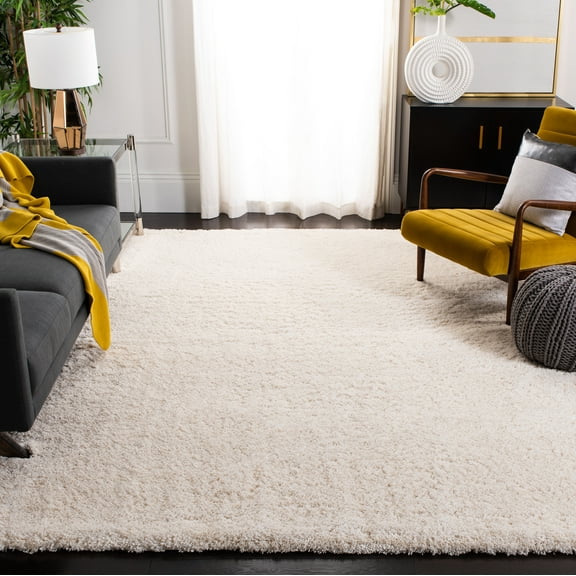 SAFAVIEH Colorado Tarek Solid Shag Area Rug, Creme, 5'1" x 7'6"