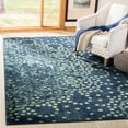 thumbnail image 1 of SAFAVIEH Constellation Vintage Gloriana Polka Dot Area Rug, Blue/Multi, 5'3" x 7'6", 1 of 8