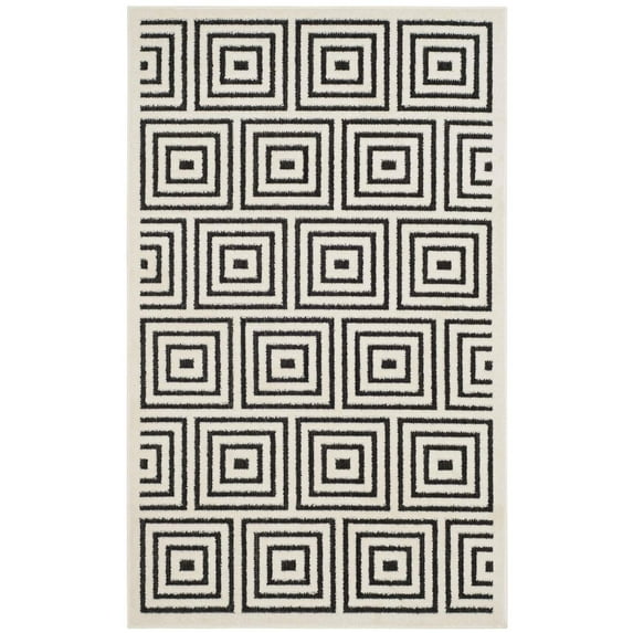 SAFAVIEH Cottage Laraine Geometric Indoor/Outdoor Area Rug Black/Cream, 3'3" x 5'3"