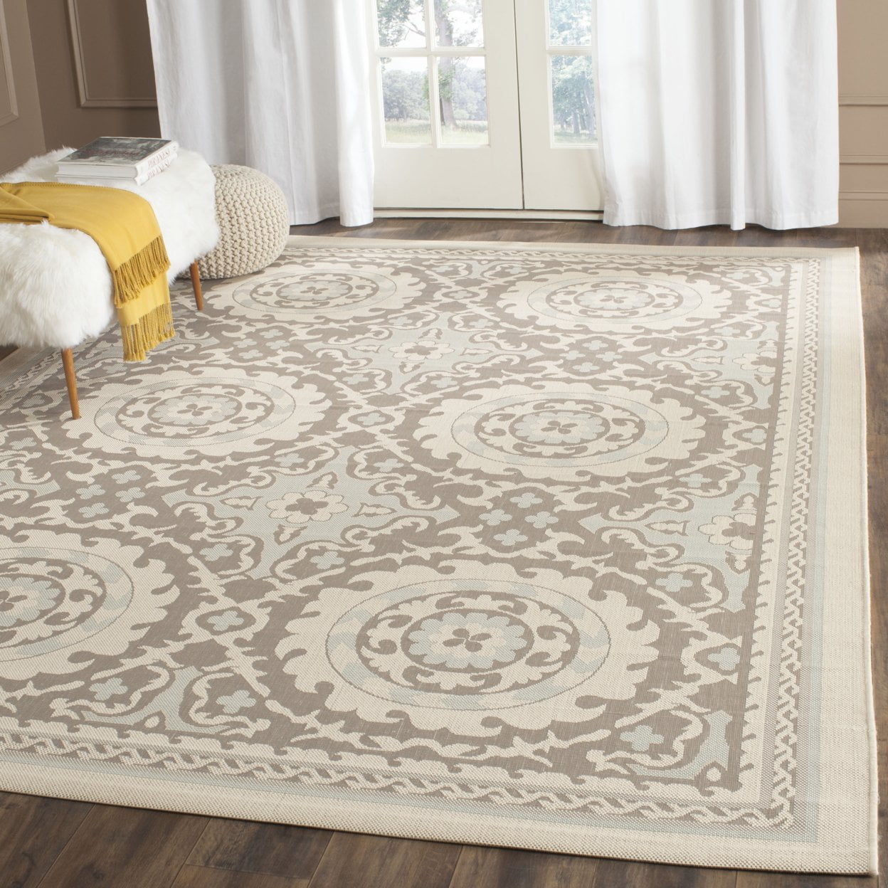 Ivory and Beige Rectangular Synthetic Indoor/Outdoor Area Rug